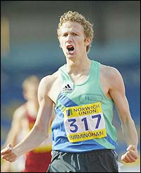 Ricky Soos celebrates winning the 800m