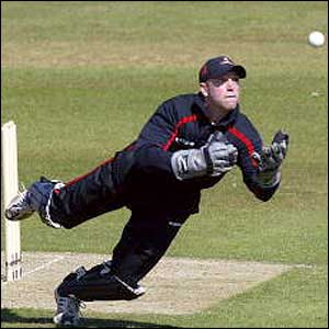 Matt Prior dives to take a catch 