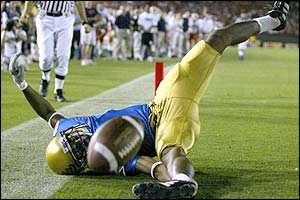 DeJuan Warren of the UCLA Bruins can't get the ball to make a touchdown