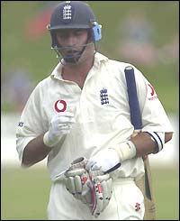 Nasser Hussain leaves the pitch after being dismissed against South Africa in the 1999-2000 series