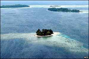 Kennedy Island (front) sits atop its own reef in the remote Western Province of the Solomon Islands