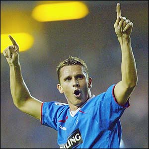 Peter Lovenkrands celebrates after he scores Rangers winner 