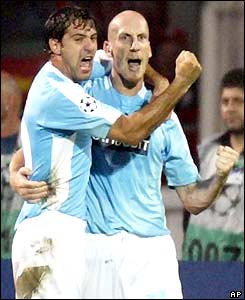 Lazio's Jaap Stam is congratulated on his goal