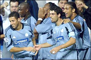 Didier Drogba celebrates his goal against Real Madrid with his team-mates