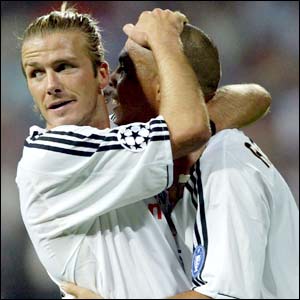 David Beckham congratulates Real Madrid team-mate Ronaldo on his second goal in the Champions League match against Marseille