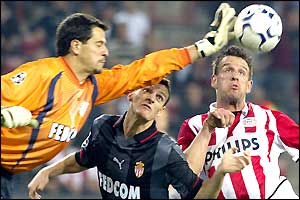 Monao goalkeeper Flavio Romas stretches to palm away a cross