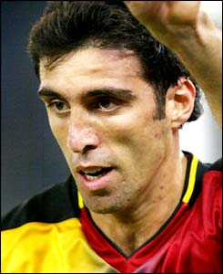 Hakan Sukur celebrates his goal