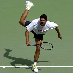 Mark Philippoussis practices his serve ahead of the Davis Cup