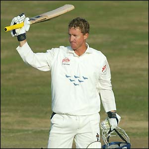 Murray Goodwin acknowledges the crowd on reaching 300 against Leicestershire