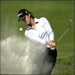 Michelle Wie hits out of a bunker