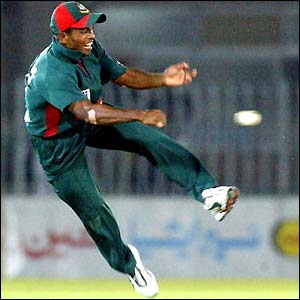 Rajin Saleh leaps into the air in an attempt to make a catch