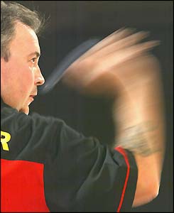 Phil 'The Power' Taylor in action during the final of the PDC World Matchplay Darts Championship