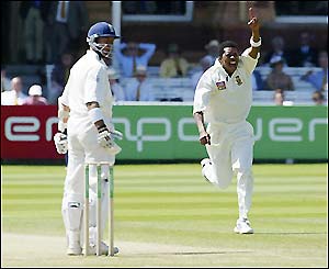 Makhaya Ntini (right) celebrates Alec Stewart's dismissal