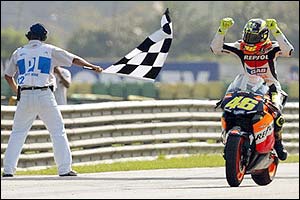 Valentino Rossi crosses the line to win the Brazilian MotoGP