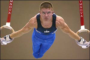 Clayton Strother of the USA competes in the rings during the men's gymnastics competition in the Pan American Games in Santo Domingo