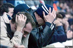 Spurs fans look dejected after losing 4-0 to Chelsea in the 2002 FA Cup quarter-finals
