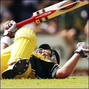 Australia's Matthew Hayden falls over during the third one-day international against Bangladesh in Darwin 