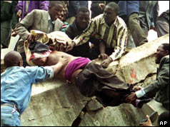 Rescuers drag a survivor out of the rubble in Nairobi