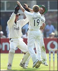 Derbyshire's players celebrate the dismissal of Gloucestershire keeper Jack Russell