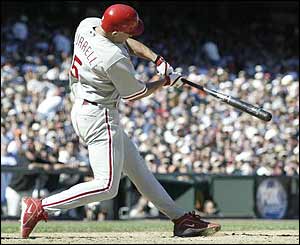 Philadelphia Phillies' Pat Burrell hits his second home run of the day against the San Francisco Giants at Pac Bell Park 