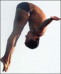 Mexican diver Rommel Pacheco flips to win the gold medal at the 10m diving event at the 2003 Pan American Games