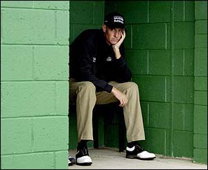 Maarten Lafeber of Holland sits in the rain shelter on the 16th tee during the second round of the 2003 Dunhill Links Championship 