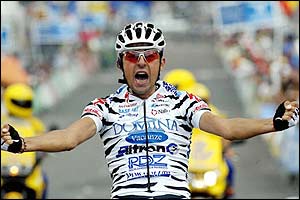 Italian Filippo Simeoni of Domina Vacanze celebrates as he crosses the finish line in the 19th stage of the 58th Tour of Spain