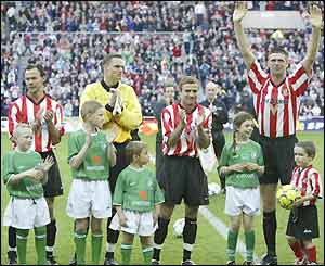 Quinn donates the money from his testimonial to charity