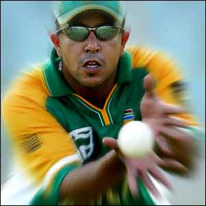 South Africa's Paul Adams catches a ball in training