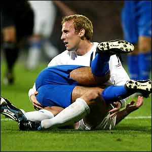 Wigan's Neil Roberts in an unusual tangle with a Cardiff player
