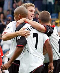 Fulham's Steve Marlet celebrates with Moritz Volz after scoring his side's equaliser