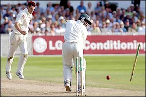 James Anderson comprehensively bowls South Africa's Paul Adams