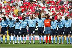 City players observe a minute's silence in memory of former team-mate Marc-Vivien Foe