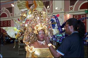 Lilith from the Burrokeets UK gets her makeup applied before the performance 