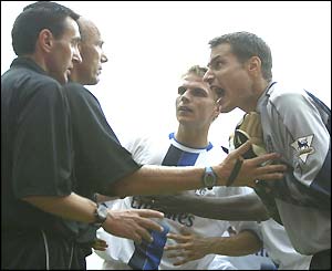 Carlo Cudicini argues with referee Steve Bennett after he ordered a penalty retake