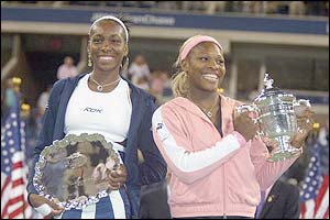 The Williams hold their trophy's aloft