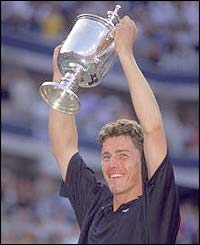 Marat Safin lifts the 2000 US Open title after beating Pete Sampras