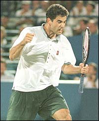 Pete Sampras celebrates winning a point during the 1996 US Open final
