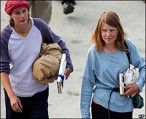Sybille Graf, left, and Silja Staeheli arrive at Zurich airport