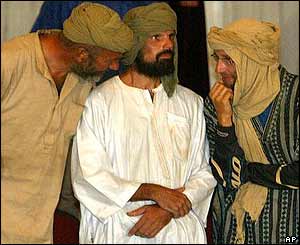 Former hostages at ceremony in Mali presidential palace