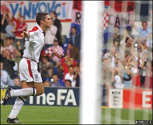 Frank Lampard celebrates scoring England's third goal on 80 minutes