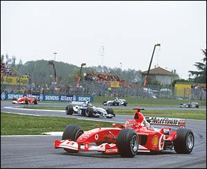 Michael Schumacher leads brother Ralf, team-mate Rubens Barrichello, Juan Pablo Montoya and Mark Webber of Jaguar during the San Marino Grand Prix