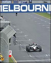 McLaren's David Coulthard celebrates winning the Australian Grand Prix
