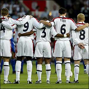 England's footballers observe a minutes silence