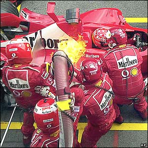 Michael Schumacher's Ferrari on fire in the pitlane during the Austrian Grand Prix