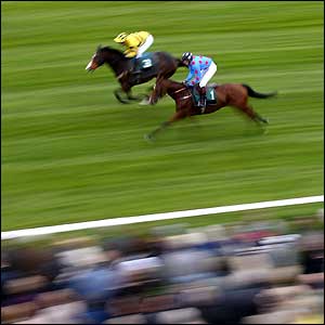 Robert Stephens on board Ragdale Hall and Richard Hobson riding Polish Pilot in action during the Alphameric Red Onion Novices' Steeple Chase at Towcester Racecourse 
