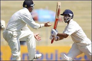 New Zealand's Mark Richardson jumps out of the way of Sourav Ganguly's shot
