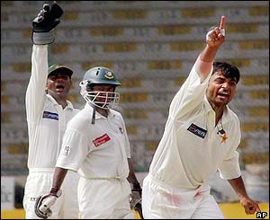 Bangladesh's Hannan Sarkar is out lbw to the spin of Mohammad Hafeez for 30