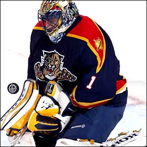 Roberto Luongo makes a save against the Carolina Hurricanes