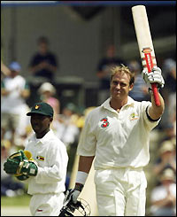 Matthew Hayden celebrates reaching 200